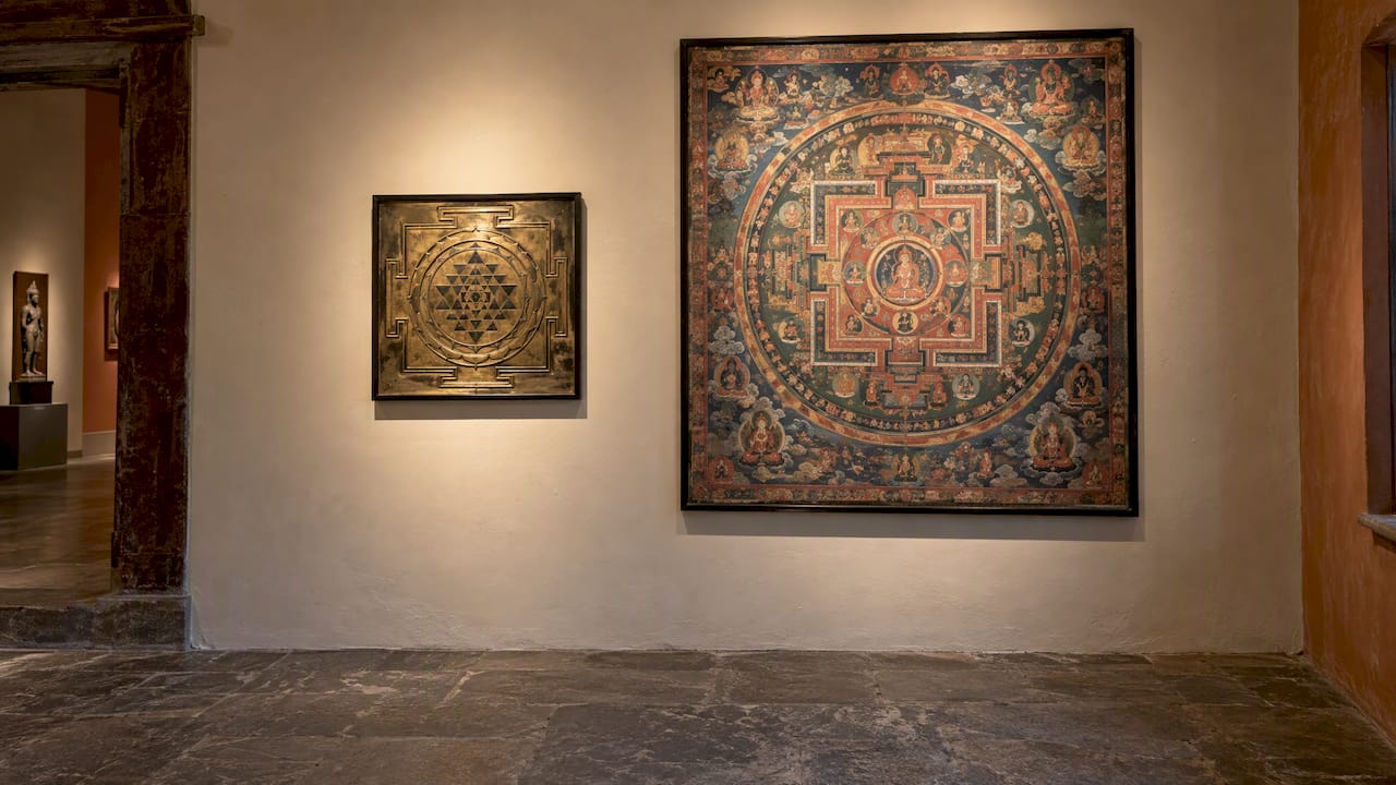 Mandala and yantra displayed in gallery