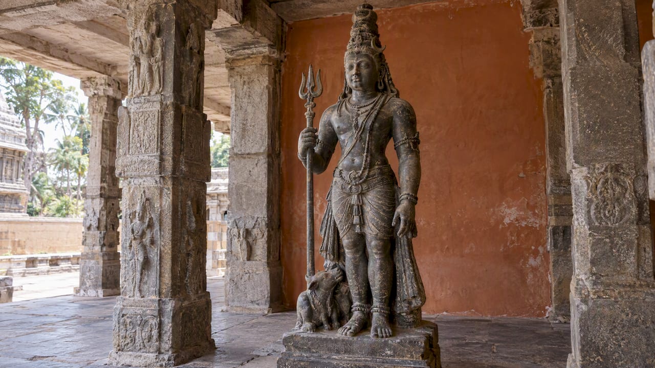 Stone Shiva sculpture with a matted-hair crown